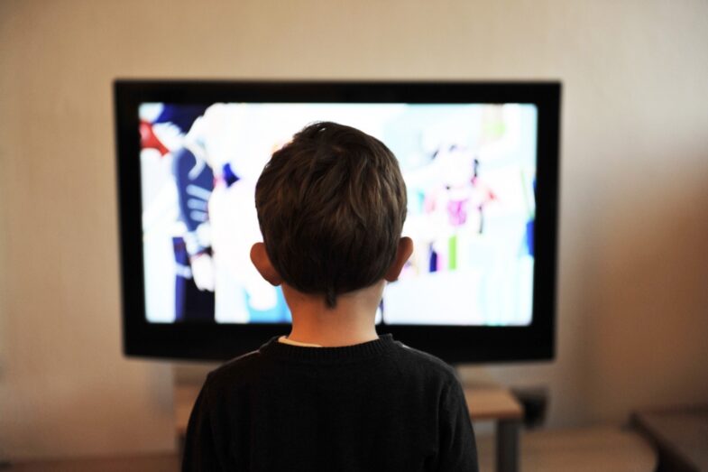 Child in front of television